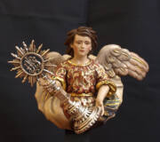 Arcángel portador de la custodia en el trono de la Sagrada Cena