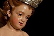 Detalle del tierno rostro del Niño Jesús redentor de la humanidad