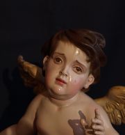Detalle del rostro de dolor del ángel