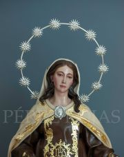 Nuestra Señora del Carmen embarazada coronada con doce estrellas