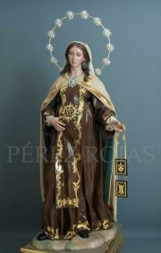 Escultura de Nuestra Señora del Carmen embarazada obra en terracota y telas encoladas